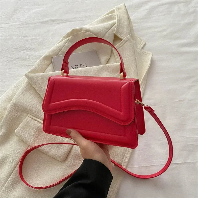 Bolsa transversal feminina
