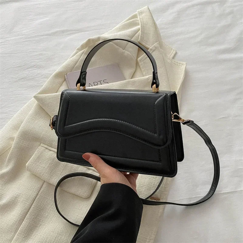 Bolsa transversal feminina