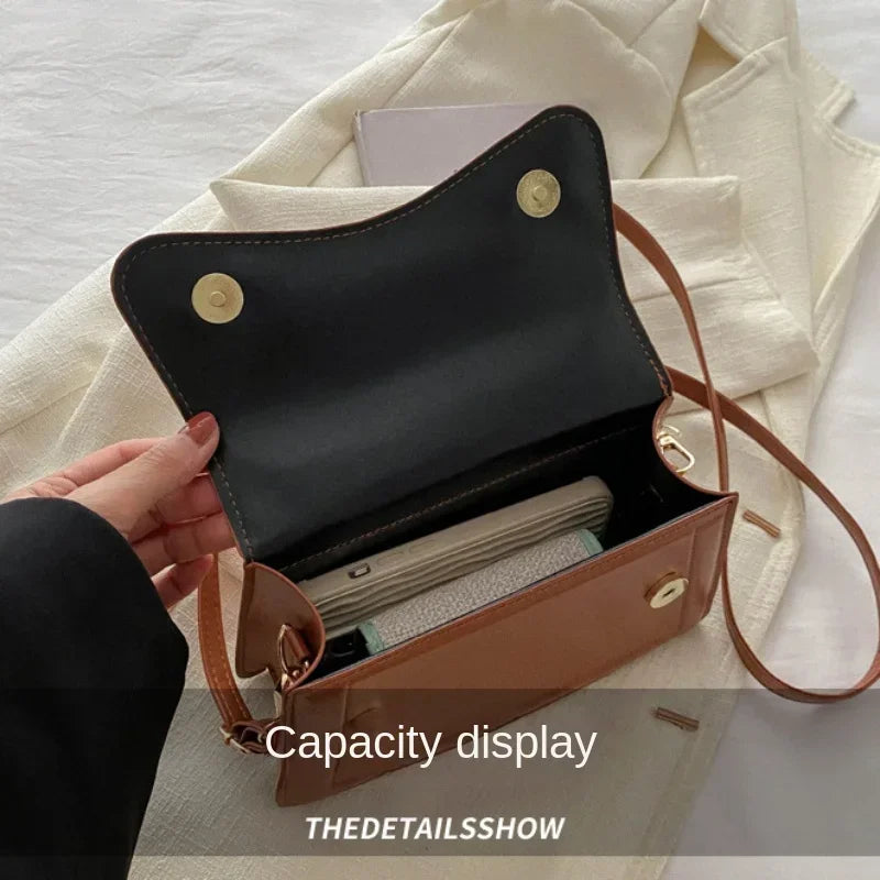 Bolsa transversal feminina