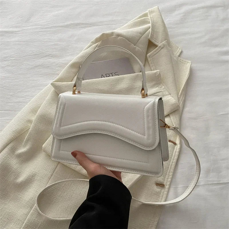 Bolsa transversal feminina