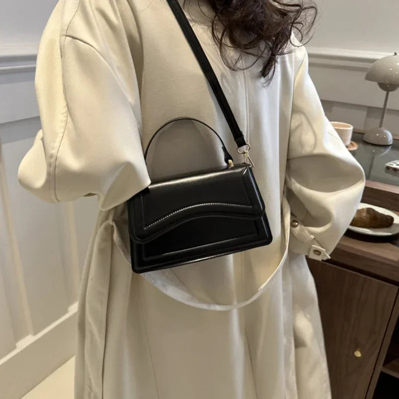 Bolsa transversal feminina