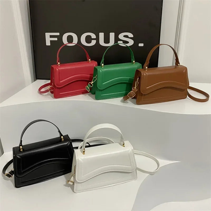 Bolsa transversal feminina