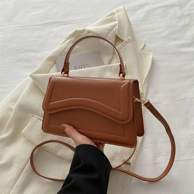 Bolsa transversal feminina