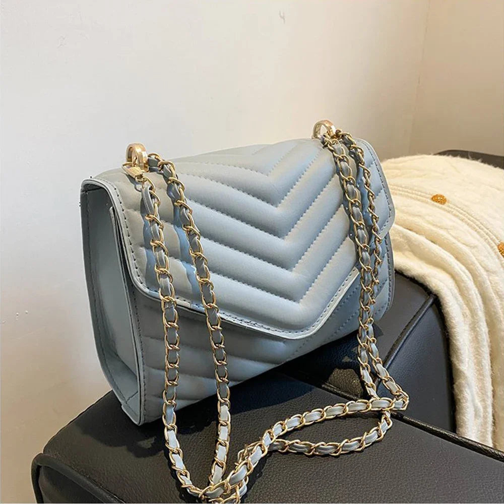 Bolsa transversal retrô feminina