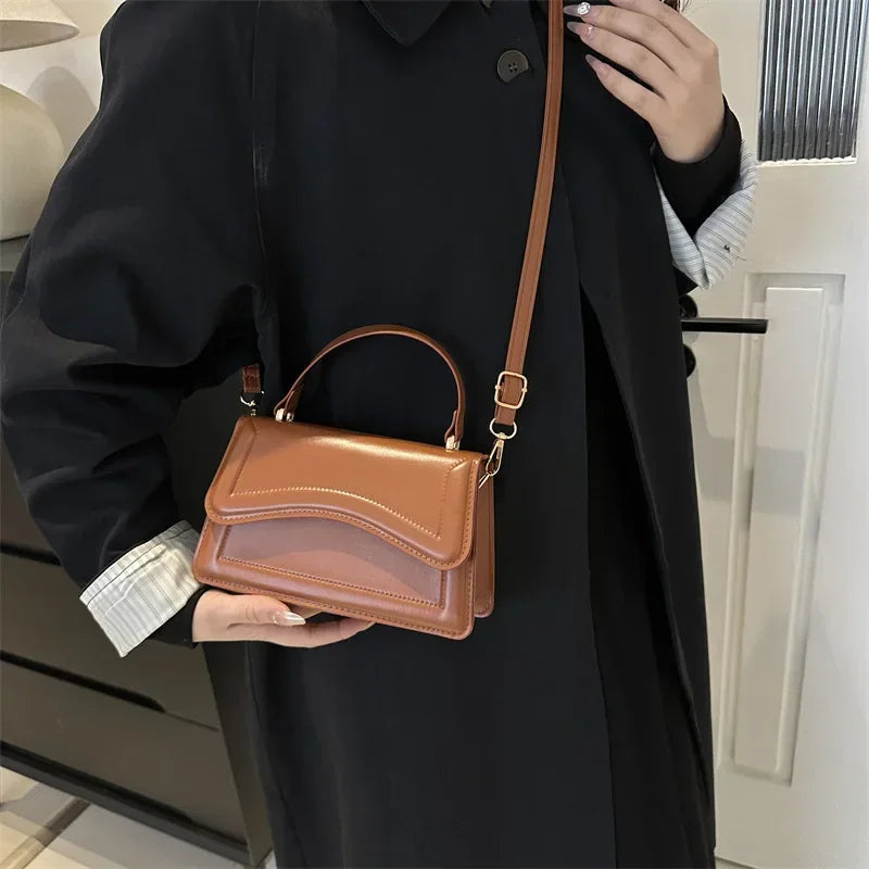 Bolsa transversal feminina